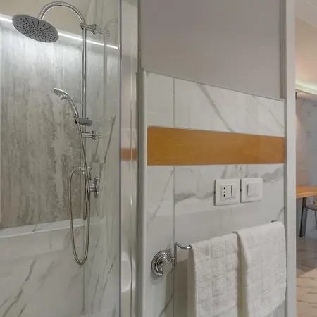 Guesthost - Mini Loft San Carlo A 5 Min Da Mambo Apartment
