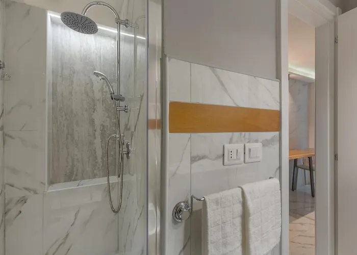 Guesthost - Mini Loft San Carlo A 5 Min Da Mambo Apartment